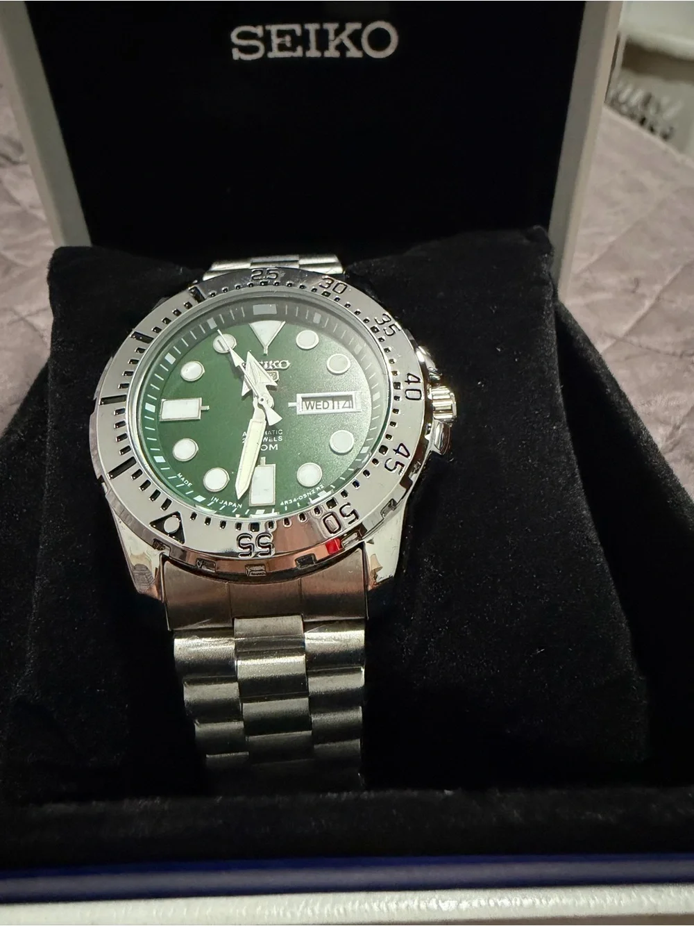 Seiko Stainless Steel Watch with Green Dial and Silver Bezel